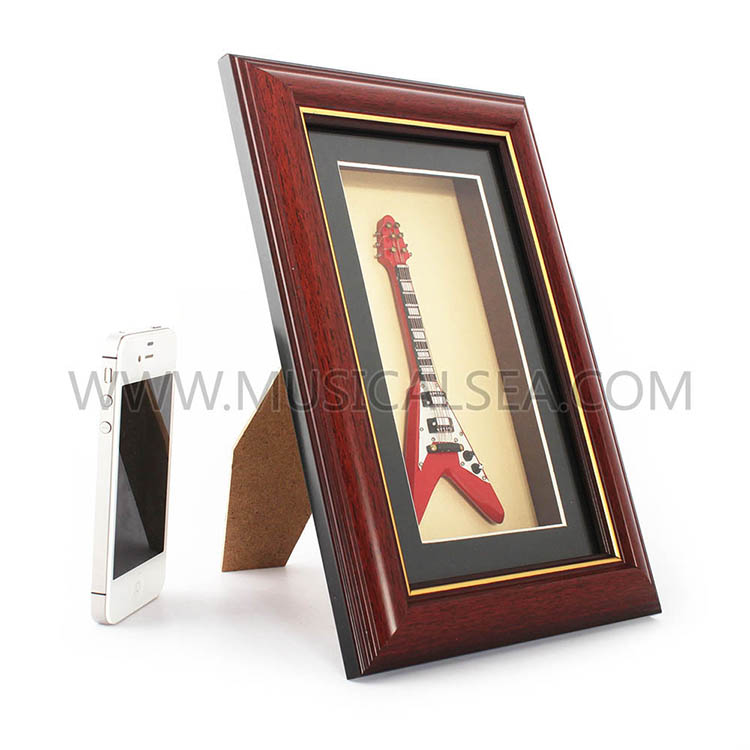 Photo frame with mini guitar and decorative p